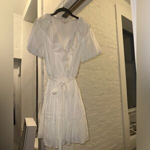 White ruffle tie waist mini dress